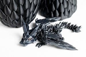 Obsidian / Small baby in a regular egg